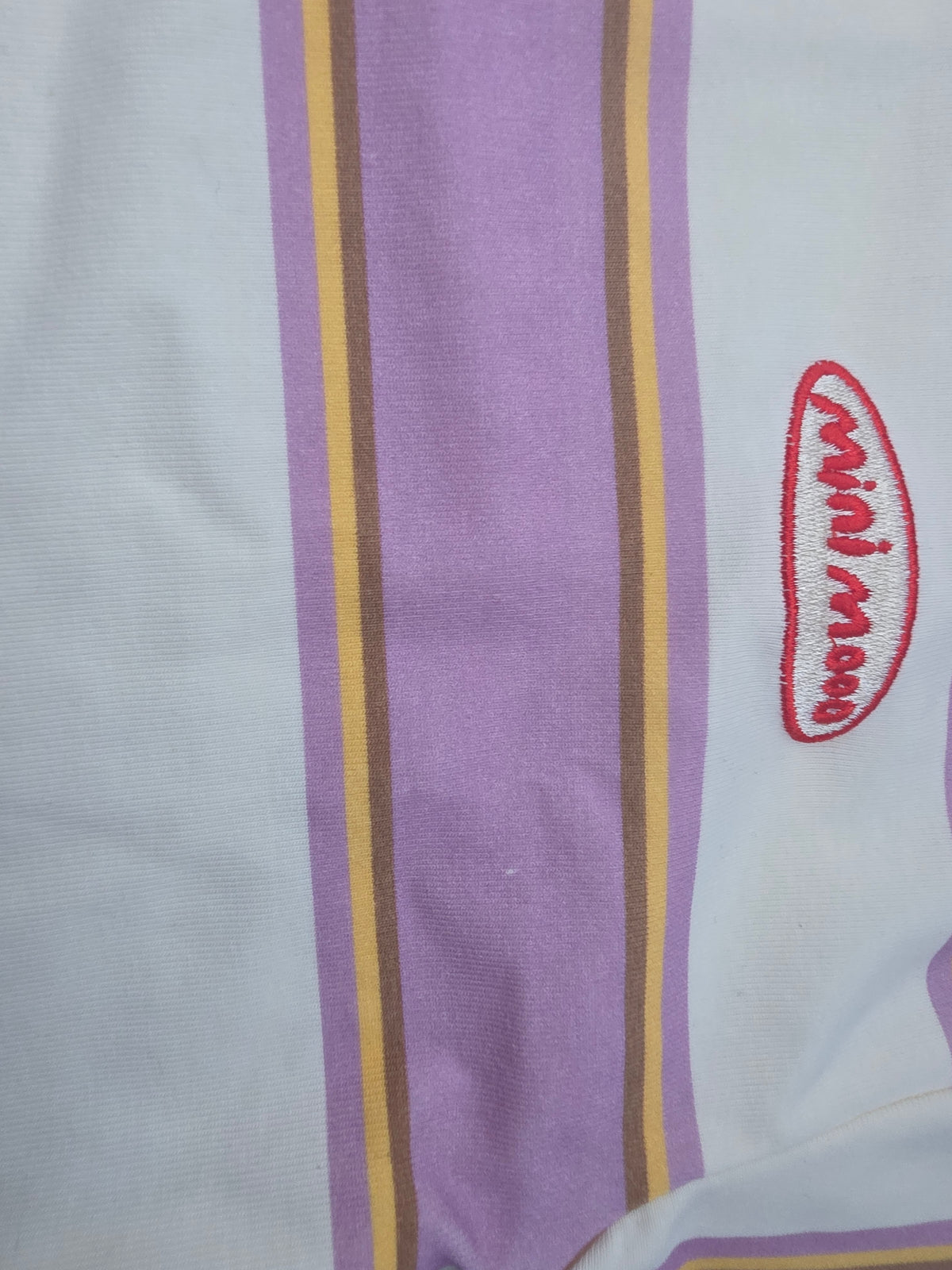 Faulty lilac stripped top